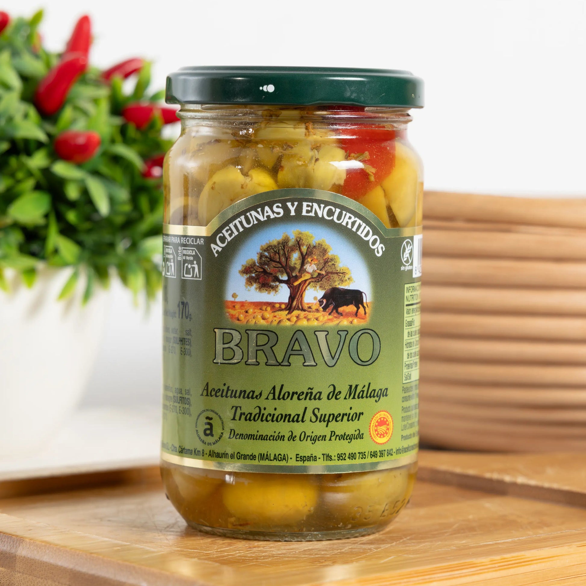 Bravo Aloreña de Málaga PDO olives in a 170 g glass jar, cracked green olives with red pepper and herbs in the brine