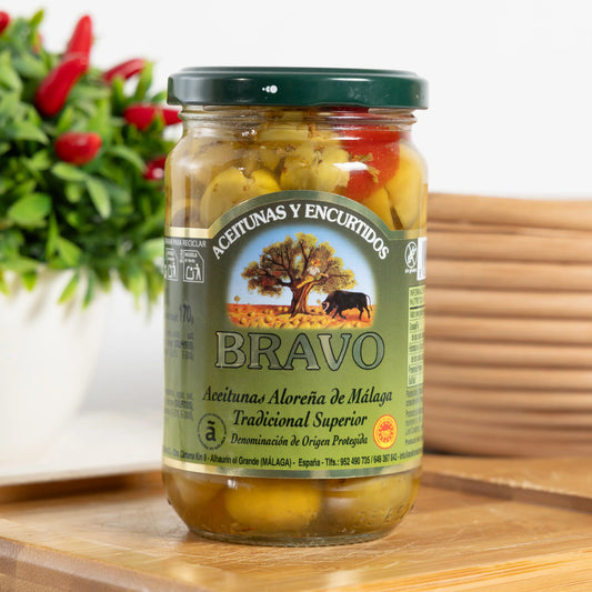 Bravo Aloreña de Málaga PDO olives in a 170 g glass jar, cracked green olives with red pepper and herbs in the brine