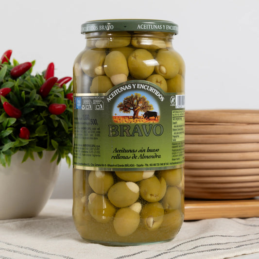 Bravo pitted green olives stuffed with whole almonds in a 500 g
glass jar, almond visible in each olive