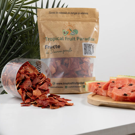 Dehydrated watermelon pieces in a 100 g Tropical Fruit Paradise
kraft pouch, deep red slices with black seeds still in them