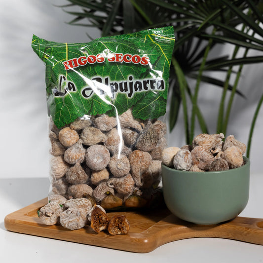 Dried La Alpujarra figs in a clear bag and a bowl, pale skins
covered in natural sugar bloom